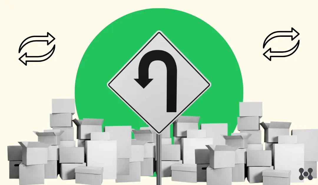 A stack of black and white boxes are shown at the bottom of the image. They are stacked roughly 1/3 the height of the image, and span from edge to edge. Emerging from the boxes is a yellow road sign with an arrow showing a "u-turn" to symbolize reverse dropshipping.
