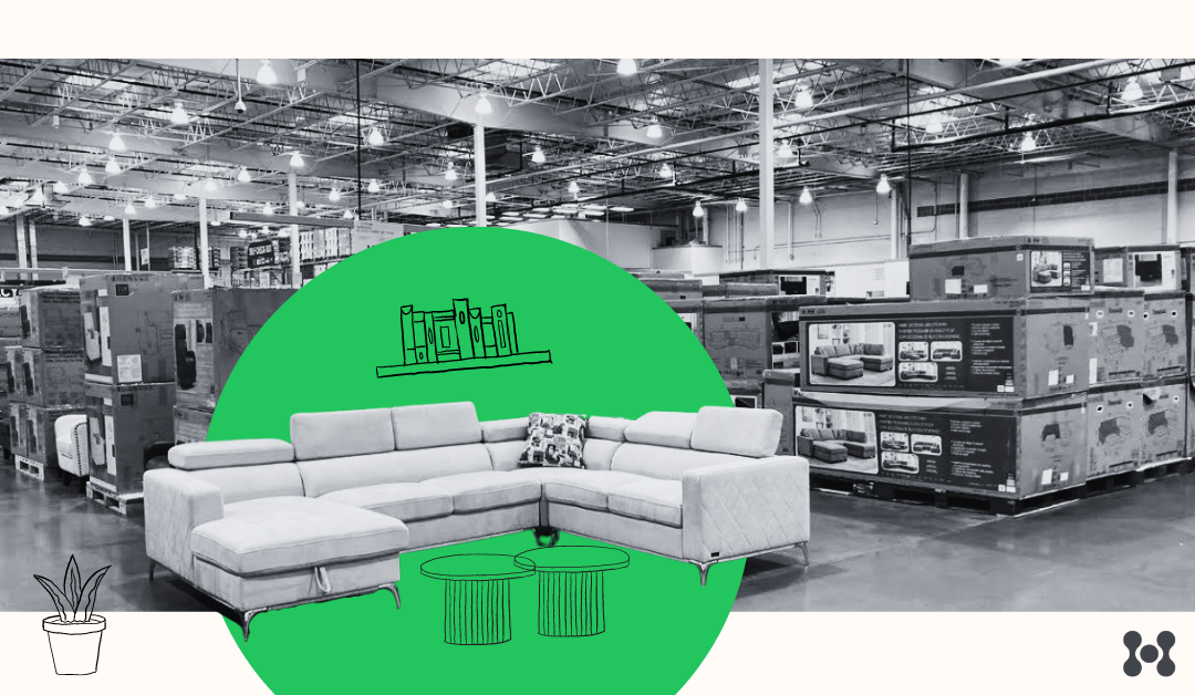 A large sectional couch is shown in a warehouse, the background is a green circle with separating the couch from the warehouse background.